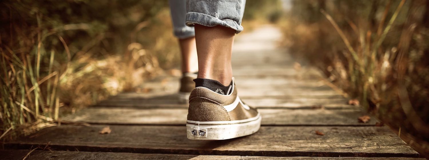 Relive Stress - Man walking on pathway