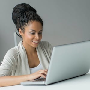 Your cover letter - Young Woman working on laptop